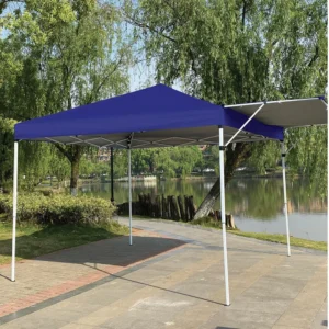 Tenda Gazebo Tobee montada em um parque à beira do lago, mostrando a aplicação para camping da Tenda Gazebo Flex 3 X 3m Dobrável Em Alumínio Uv50+ Tobee com toldo estendido.